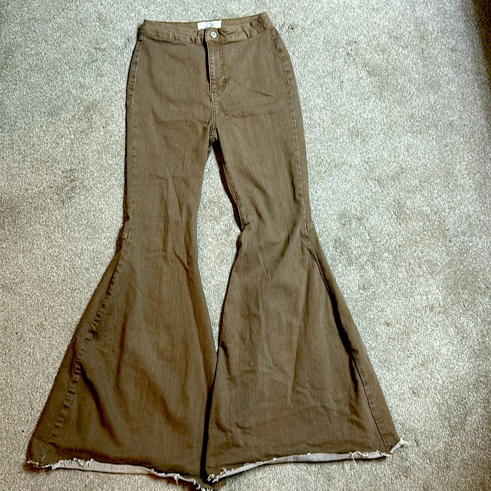 FREE PEOPLE ultra high-waisted, wide leg, tan pants.